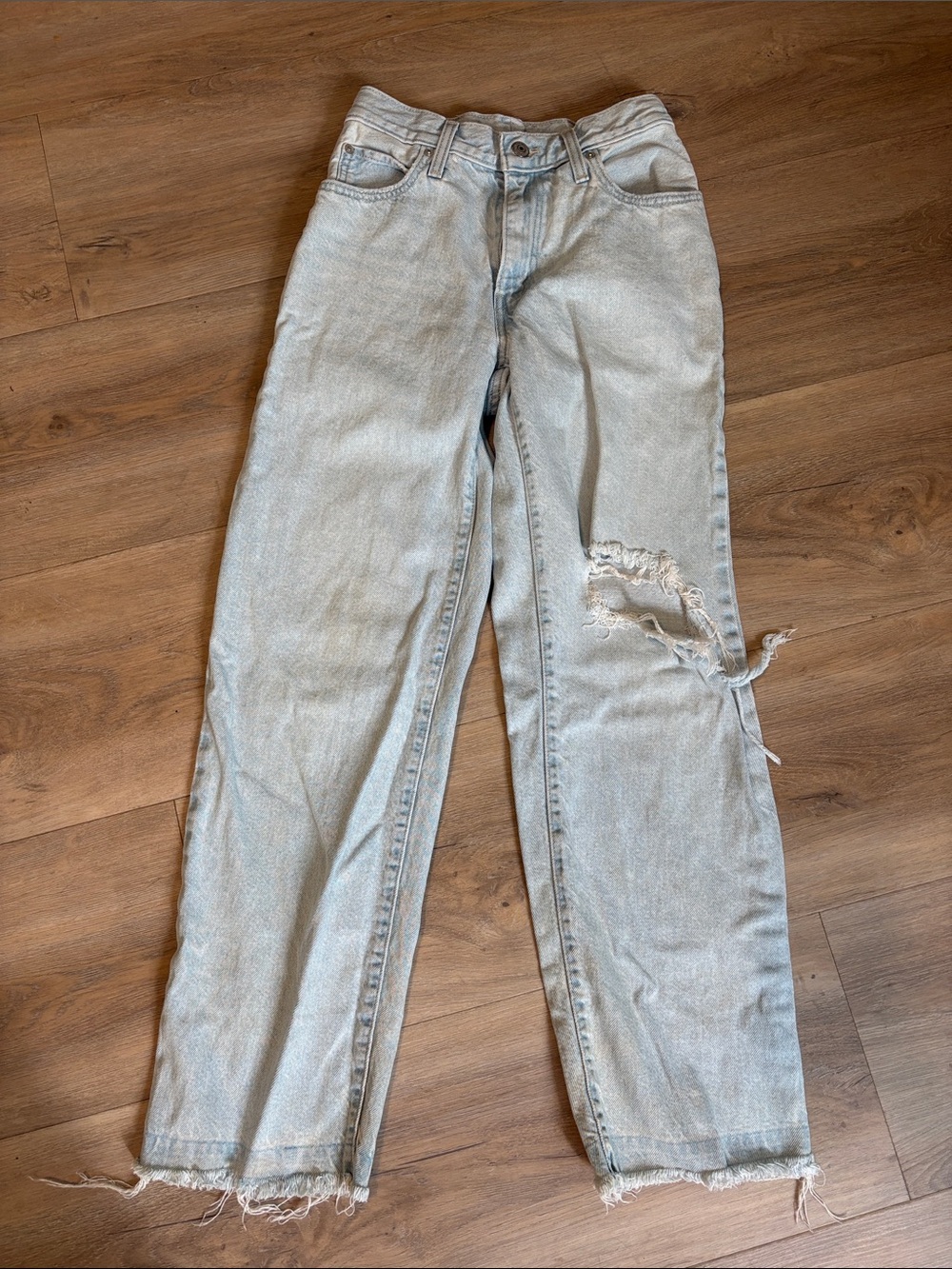 Levi's Light Blue Straight Leg Jeans with Distressed Knee